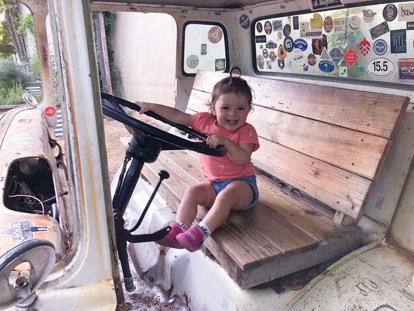 My daughter loved the truck cab that is converted into seating outside at Burial Brewing Co. in Asheville, NC